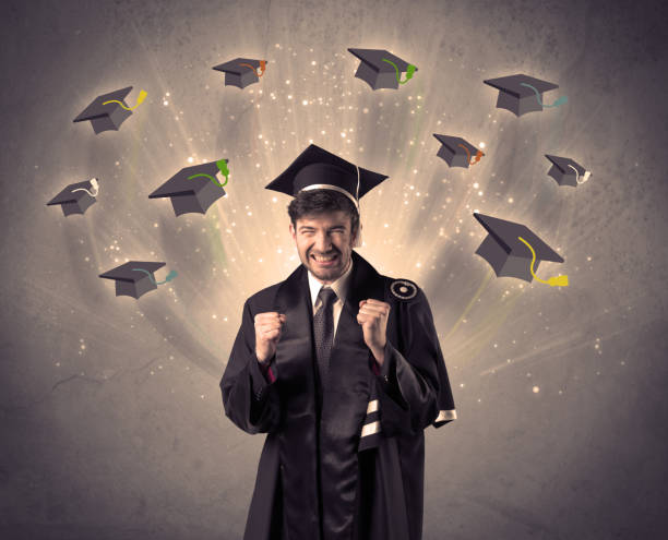 istock College graduate with many flying hats 1138850382