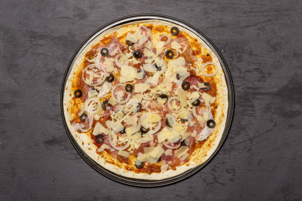 istock Recipe of pizza capriciosa on grey stone 1138851422