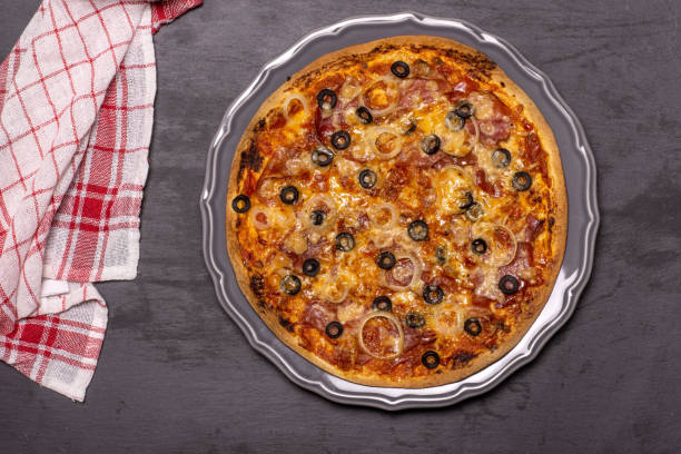 istock Recipe of pizza capriciosa on grey stone 1138851454