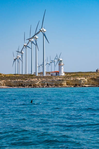 Rocky seashore and Windmills