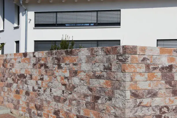Natural stone wall as a property line and sight protection