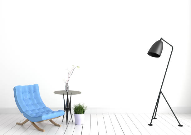 istock Modern living room interior with blue sofa lamp and plants on glass table on empty blue wall background. 3D rendering 1138857774