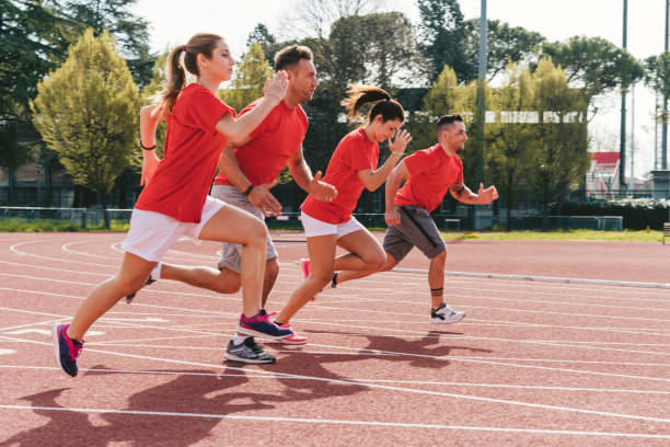 istock Group of runners running on racing track 1138859092