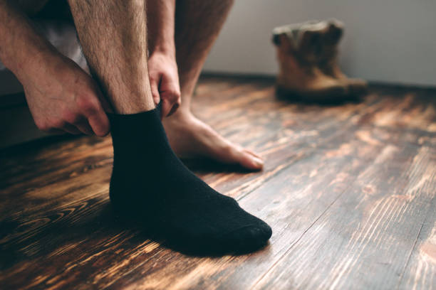The man wears black socks. Men's style. The man wears black socks. Men's style sock photos stock pictures, royalty-free photos & images