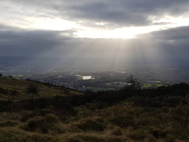 istock View over belfast from cavehill with the sun bursting through the clouds 1138864873