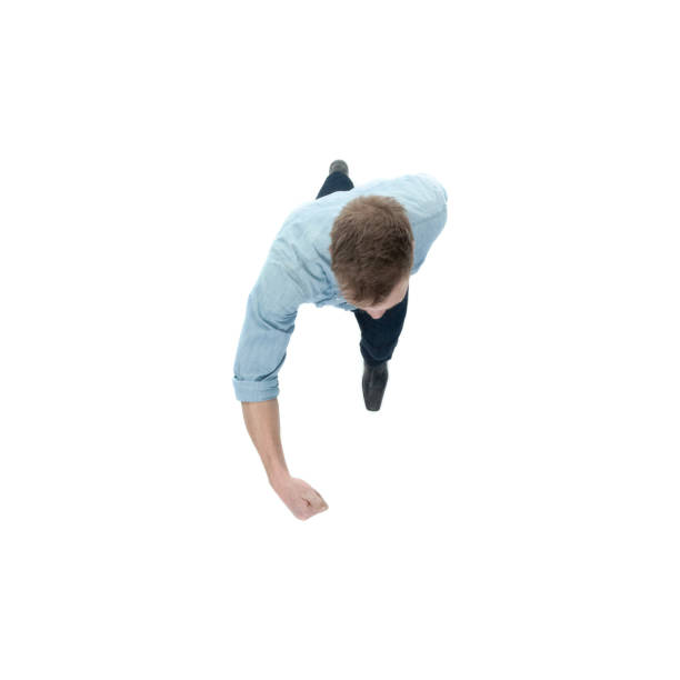 istock Directly above view of man walking 1138866617