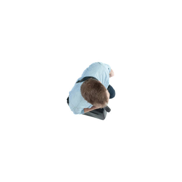 istock Directly above view of man walking and wearing a shoulder bag 1138866721