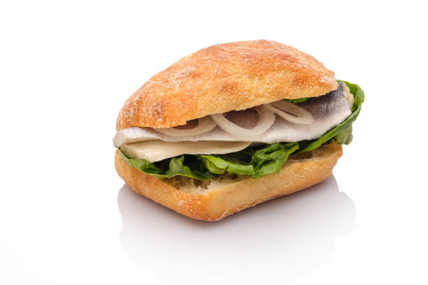 istock Sandwich roll with bismarck herring fisch and onion rings 1138867809