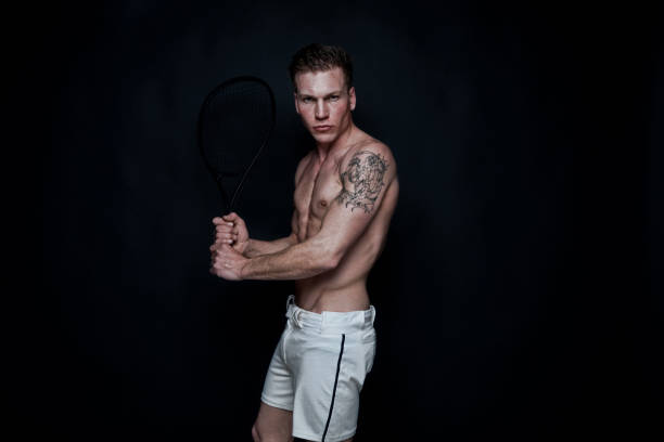 istock Sexy male tennis player 1138868691