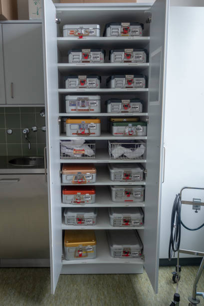 istock a cabinet full of surgical instruments Container 1138871660