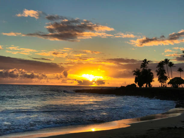 istock Hawaiian Sunset at Poipu Beach Kauai 1138872755