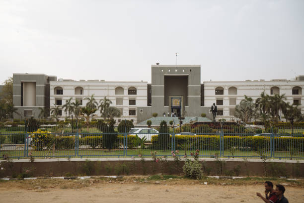 Entrance of high court of Gujarat in Ahmadabad, India. Ahmadabad, India - February 26, 2019: Entrance of high court of Gujarat in Ahmadabad, India. gujarat stock pictures, royalty-free photos & images