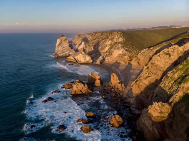 istock Aerial view of the beach with rocks 1138874802
