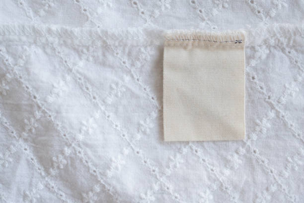 istock blank laundry care clothes label on fabric texture background 1138876884