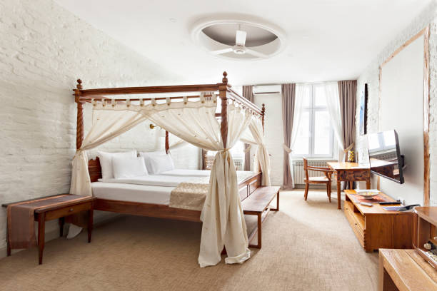istock Luxurious modern bedroom interior with canopy bed 1138879674