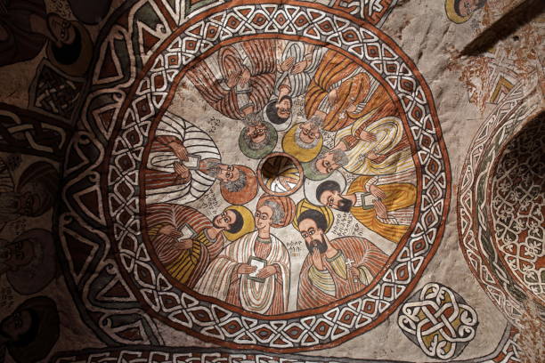 фрески святых в церкви абуна емата гух, эфиопия - rock hewn church стоковые фото и изображения