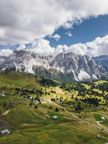Scenic panoramic view over Dolomites mountains on a sunny day