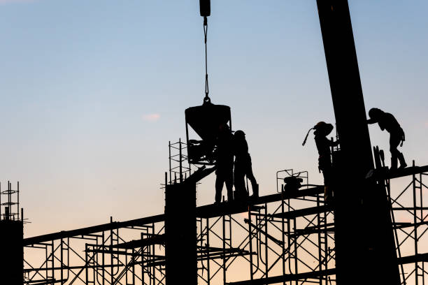 istock Silhouette of worker in the construction site 1138886983