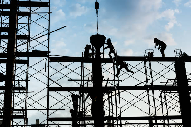 istock Silhouette of worker in the construction site 1138887096
