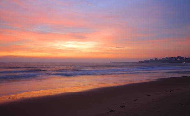 istock Cloudy sunrise on Tynemouth Longsands beach 1138888305
