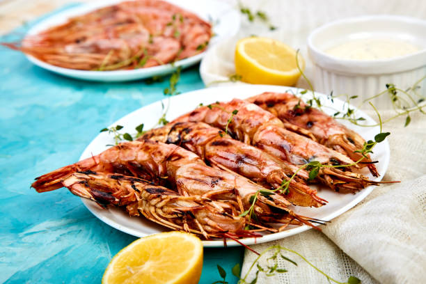 istock Grilled big tiger shrimps prawns on white plate 1138888481
