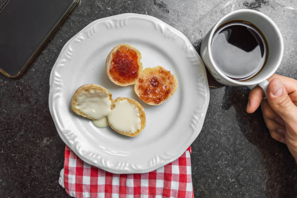 istock Personal view of a plate with cheese bread and coffee 1138890249
