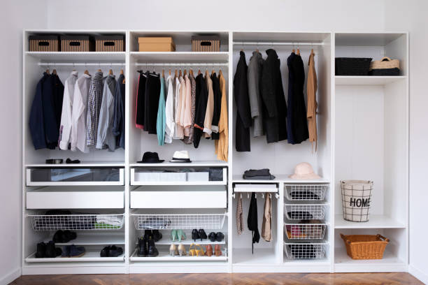 istock Big wardrobe with different clothes for dressing room 1138890587