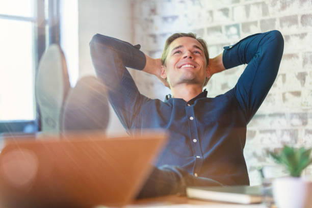 istock Young businessman enjoying his success. 1138890713