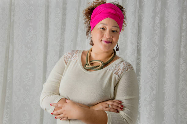 istock modern black woman smiling and looking at camera 1138892227