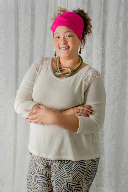 istock modern black woman smiling and looking at camera 1138892235