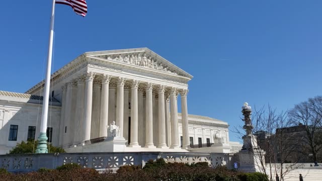 Supreme Court of the United States and American Flag in Washington, DC