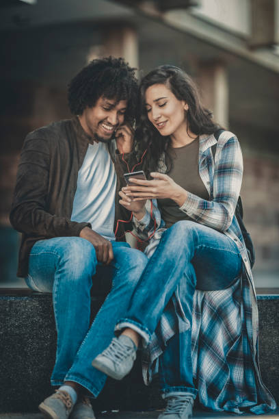 istock Beautiful young couple having fun outdoors on a lovely day 1138898100