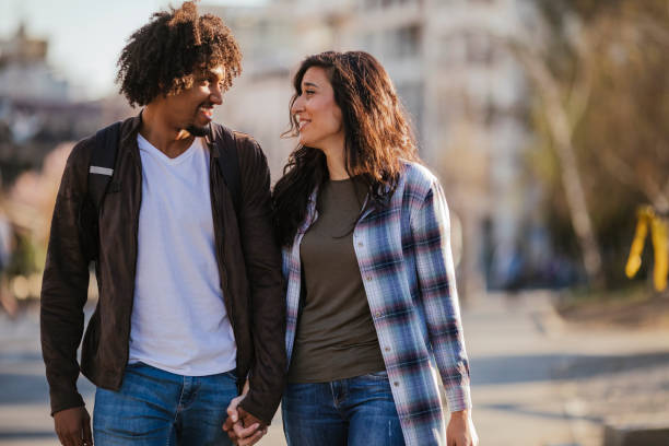 istock Beautiful young couple having fun outdoors on a lovely day 1138898145