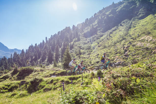 istock Mountain biking uphill - tyrol alps 1138898474