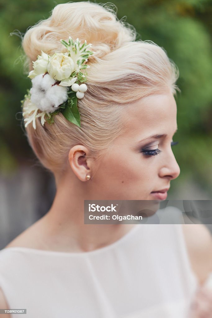 Wedding Hairstyle For The Bride Blond Blonde Hair With Accessories Hairpins  From Fresh Flowers Stock Photo - Download Image Now - iStock