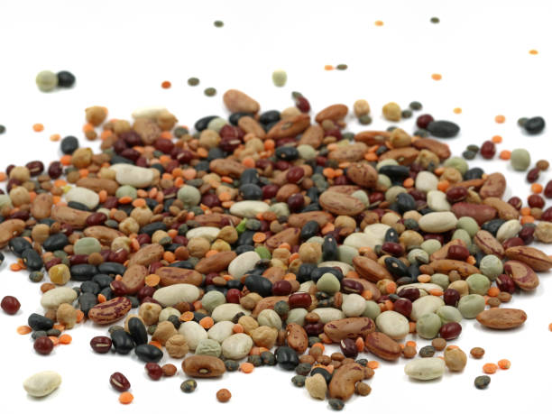 istock Mixed dried legumes isolated on white background, close up 1138901124