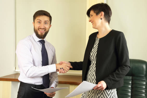 istock the business partners signed an agreement in the office 1138902420