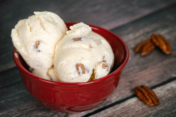 istock Butter pecan ice cream in a red bowl 1138903749