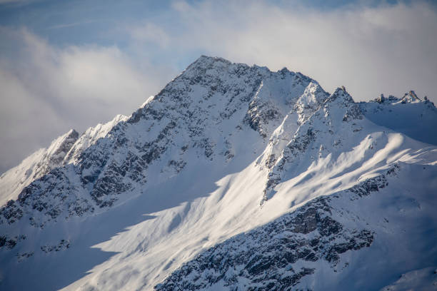 istock mountain landscape during sunrise with snow covered mountains 1138904332