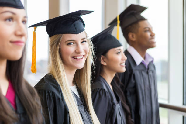 istock Beautiful female high school graduate 1138904489