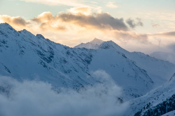 istock mountain landscape during sunrise with snow covered mountains 1138904495