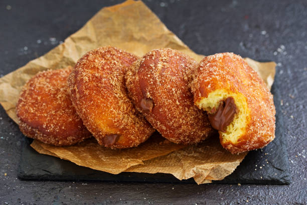 istock Donuts with cinnamon and chocolate cream. Homemade baking. Selective focus. 1138909614