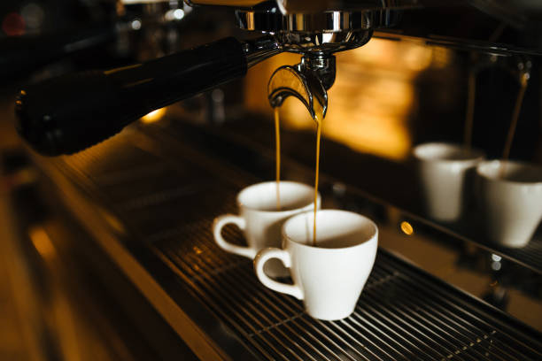 istock Two espresso cups on the coffee machine 1138910673