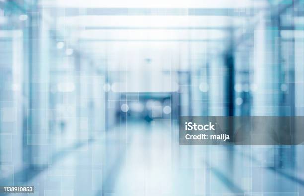 Abstract Blurred Interior Of Corridor Clinic Background In Blue Color Blurry Image Stock Photo - Download Image Now