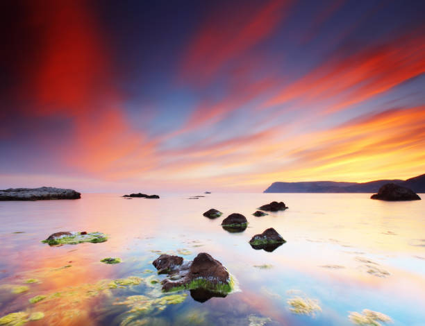 istock Majestic summer sunset over the sea. Dramatic sky. 1138915299