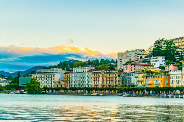 sunset view of old town of lugano facing the lugano lake in switzerland - ticino canton mountain lake lugano lake imagens e fotografias de stock