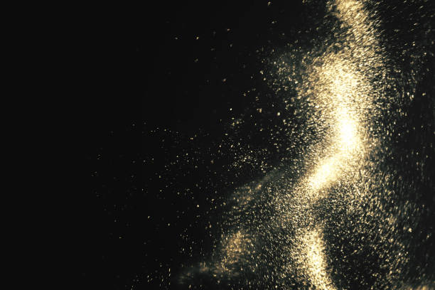 istock black and gold festive shimmering background with copy space 1138928649