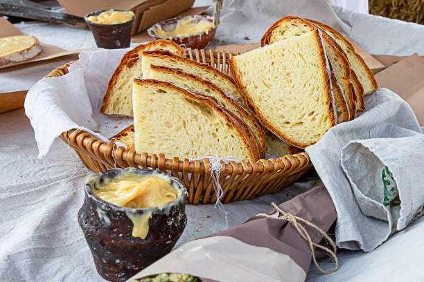 istock fresh baked bread a piece of a large loaf rustic appetizing breakfast in a basket wicker with yellow honey 1138928831