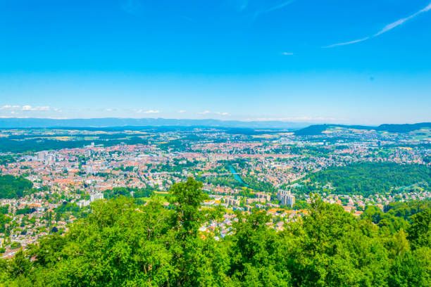 View from Gurten hill on Bern dominated by Münster cathedral and Bundeshaus, Switzerland View from Gurten hill on Bern dominated by Münster cathedral and Bundeshaus, Switzerland bundeshaus stock pictures, royalty-free photos & images