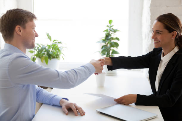 istock Successful job interview with boss and employee handshaking 1138947298